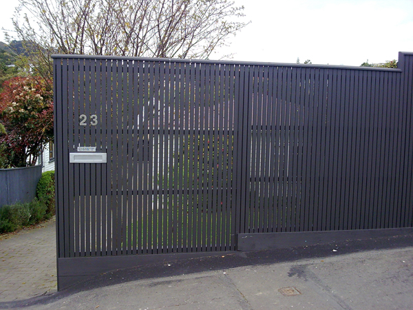 Painted vertical trellis fence
